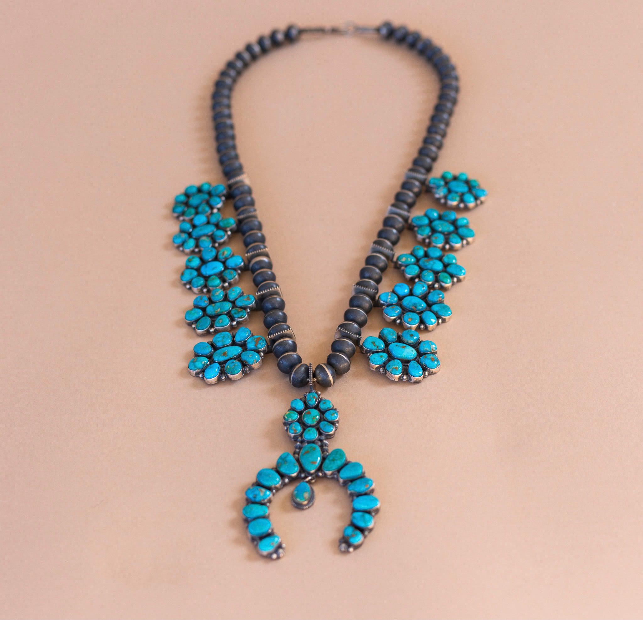 Museum quality turquoise Mountain Squash Blossom Necklace
