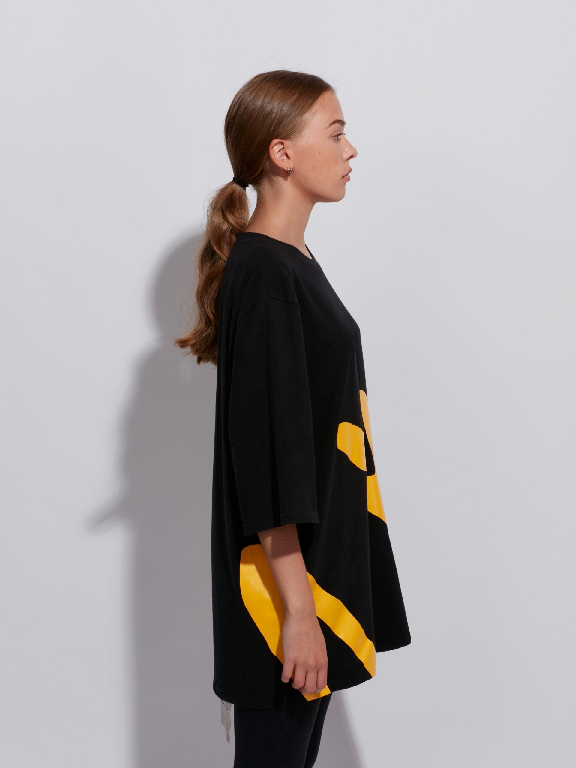 yellow-stripes-black-tee-x-edward-acosta-awaken