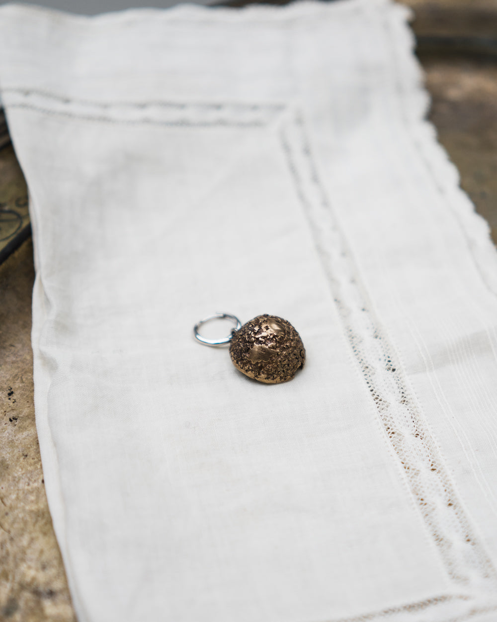 Nut Charm with a Natural Pearl