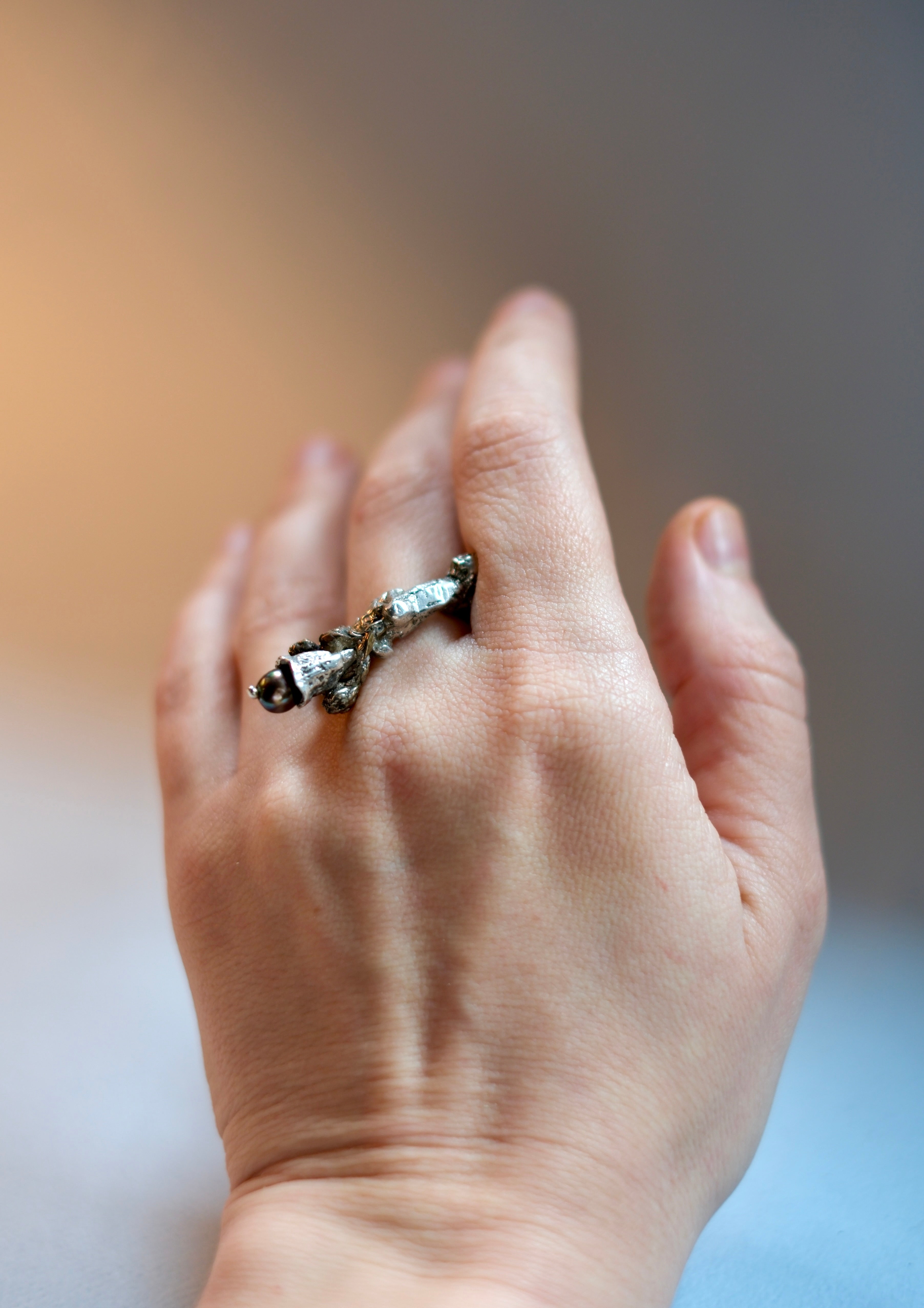Sculptural Silver Ring with Flowers and Dark Pearl