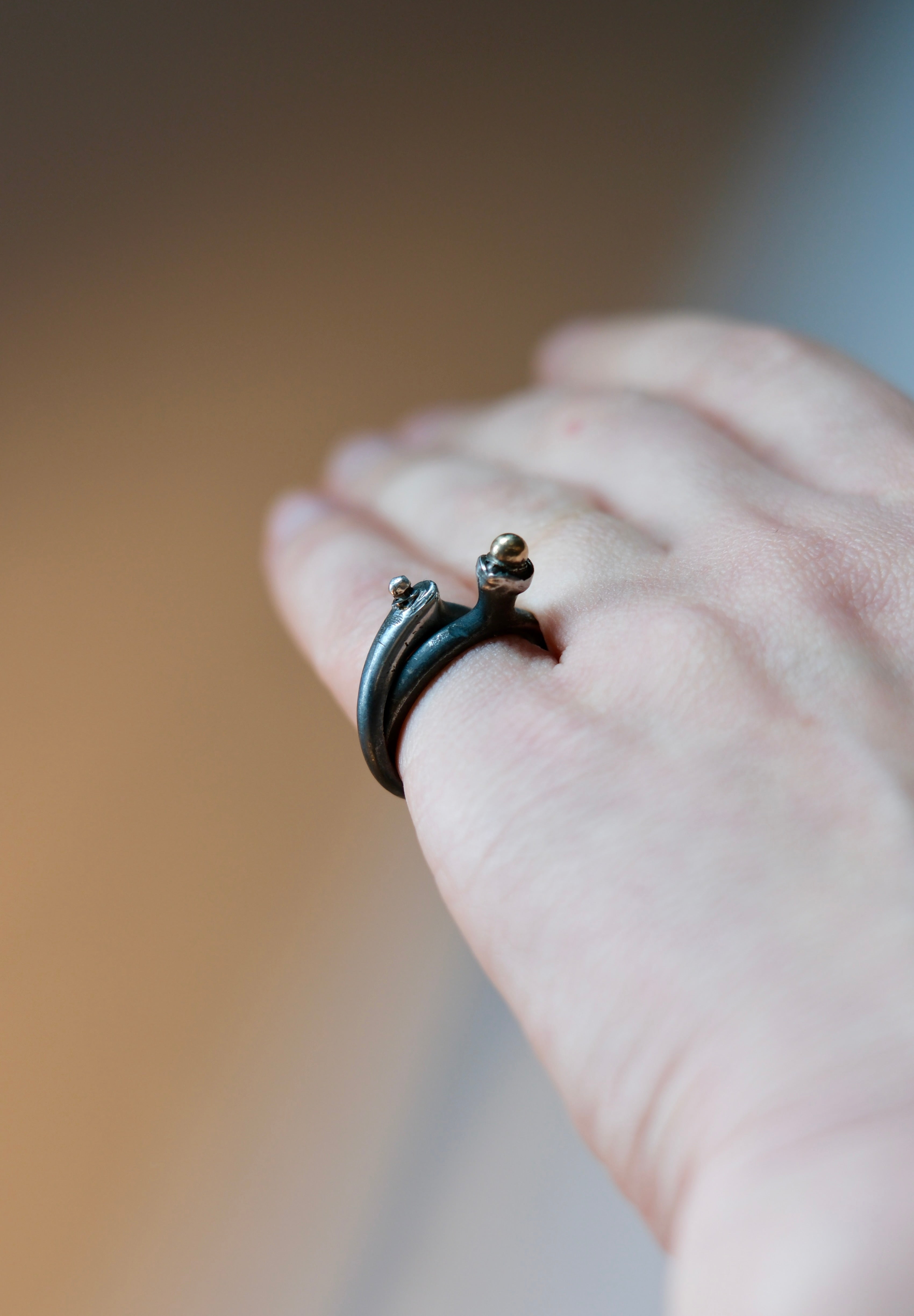 Twisted Double Band Ring with a Brass Droplet