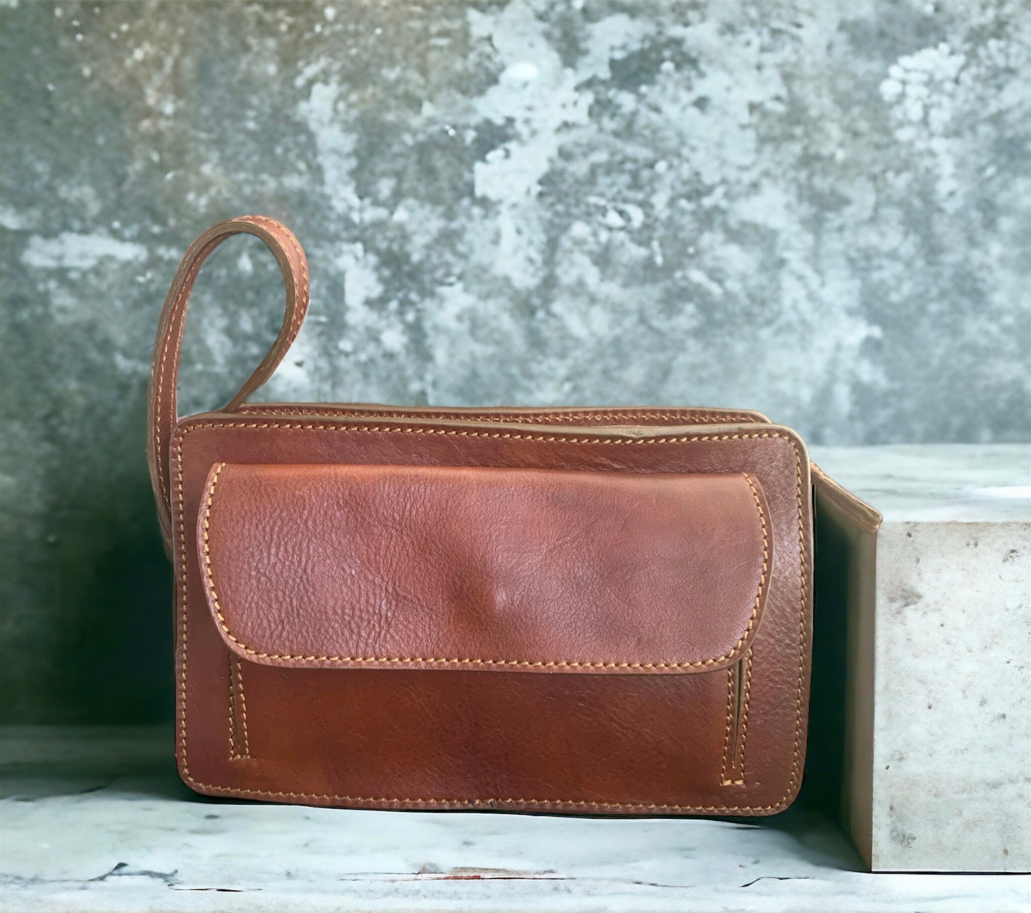 Pouch with external pocket