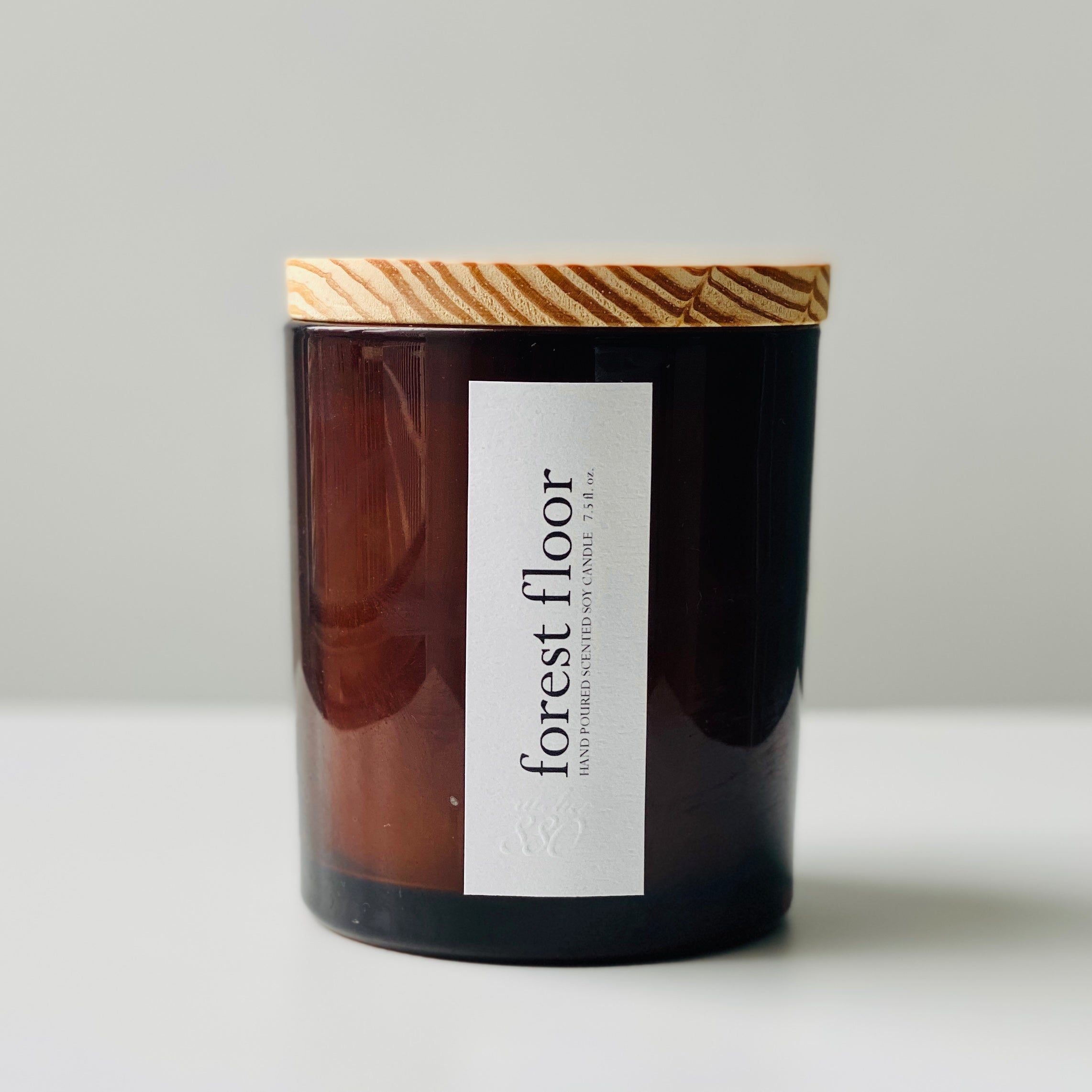 forest floor soy candle - amber glass / wood lid