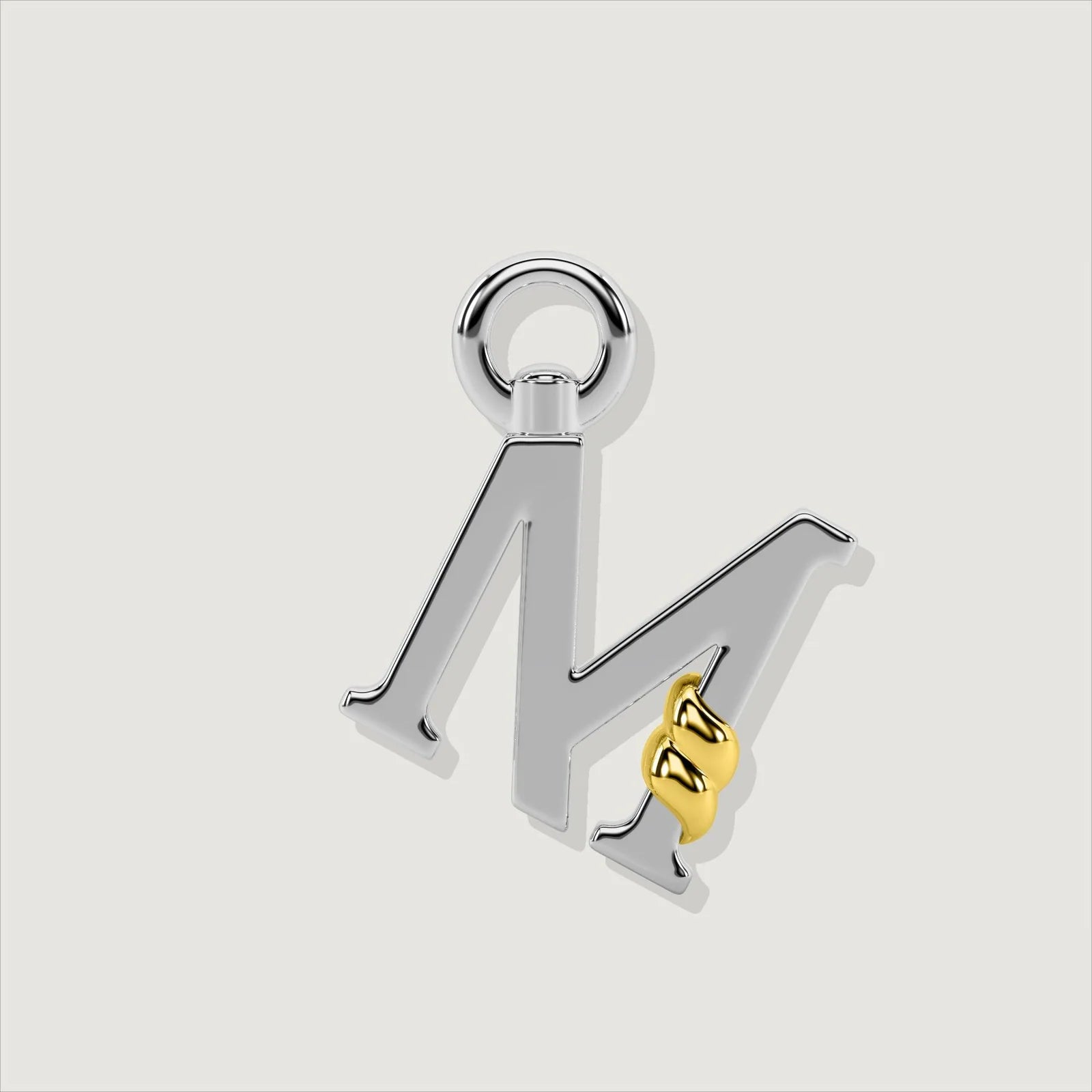 The Unius Letter M Charm