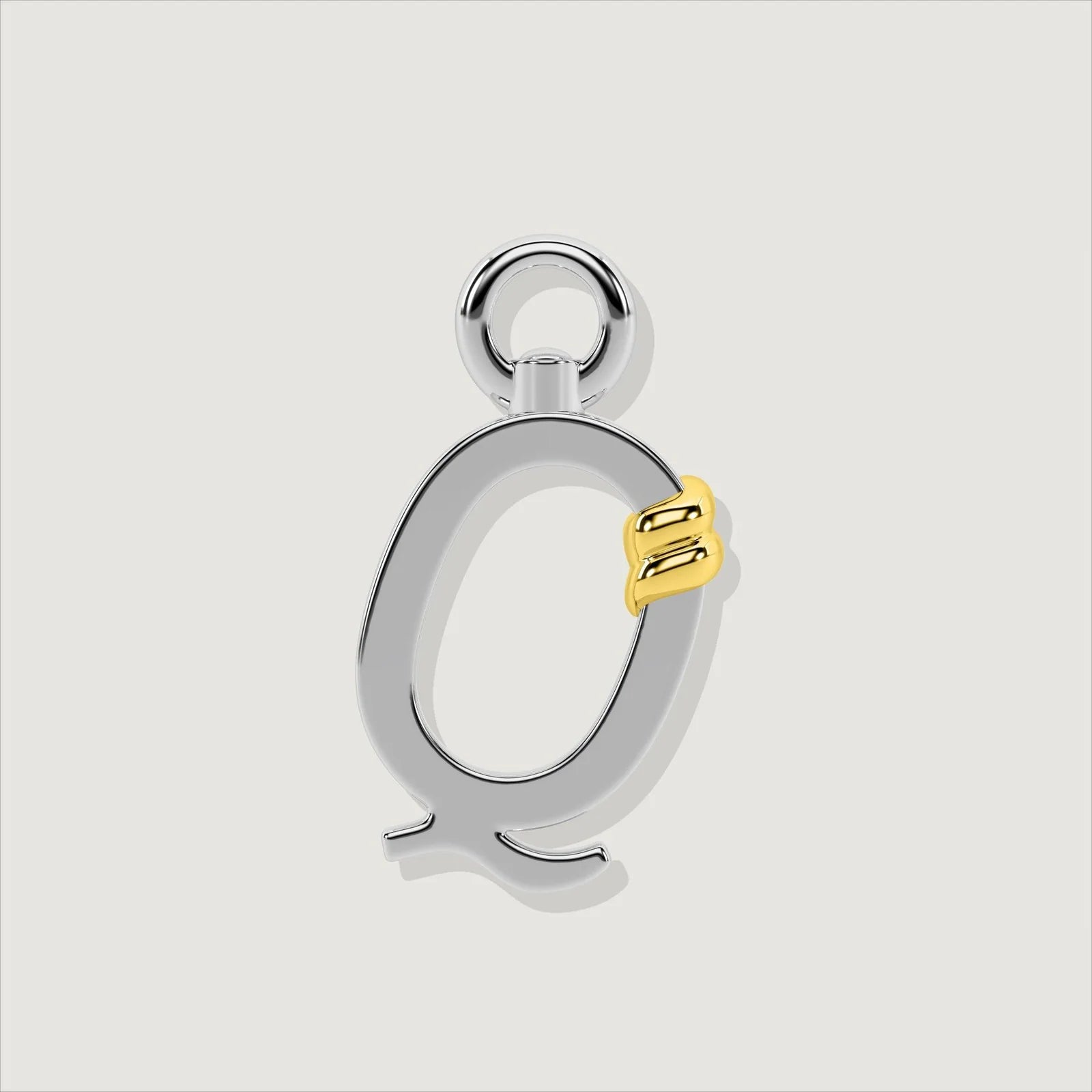 The Unius Letter Q Charm