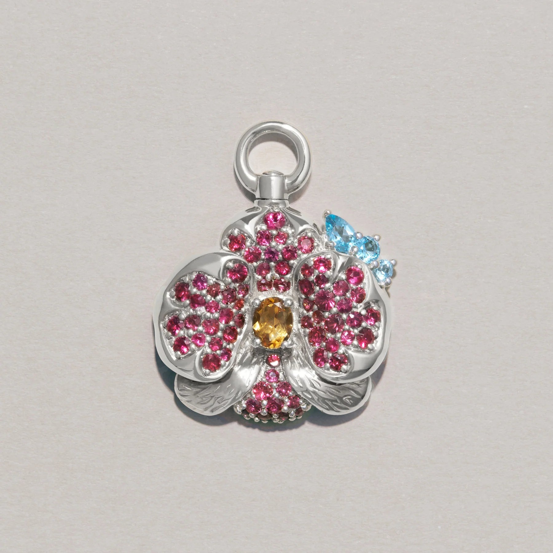The Sacred Orchid Charm