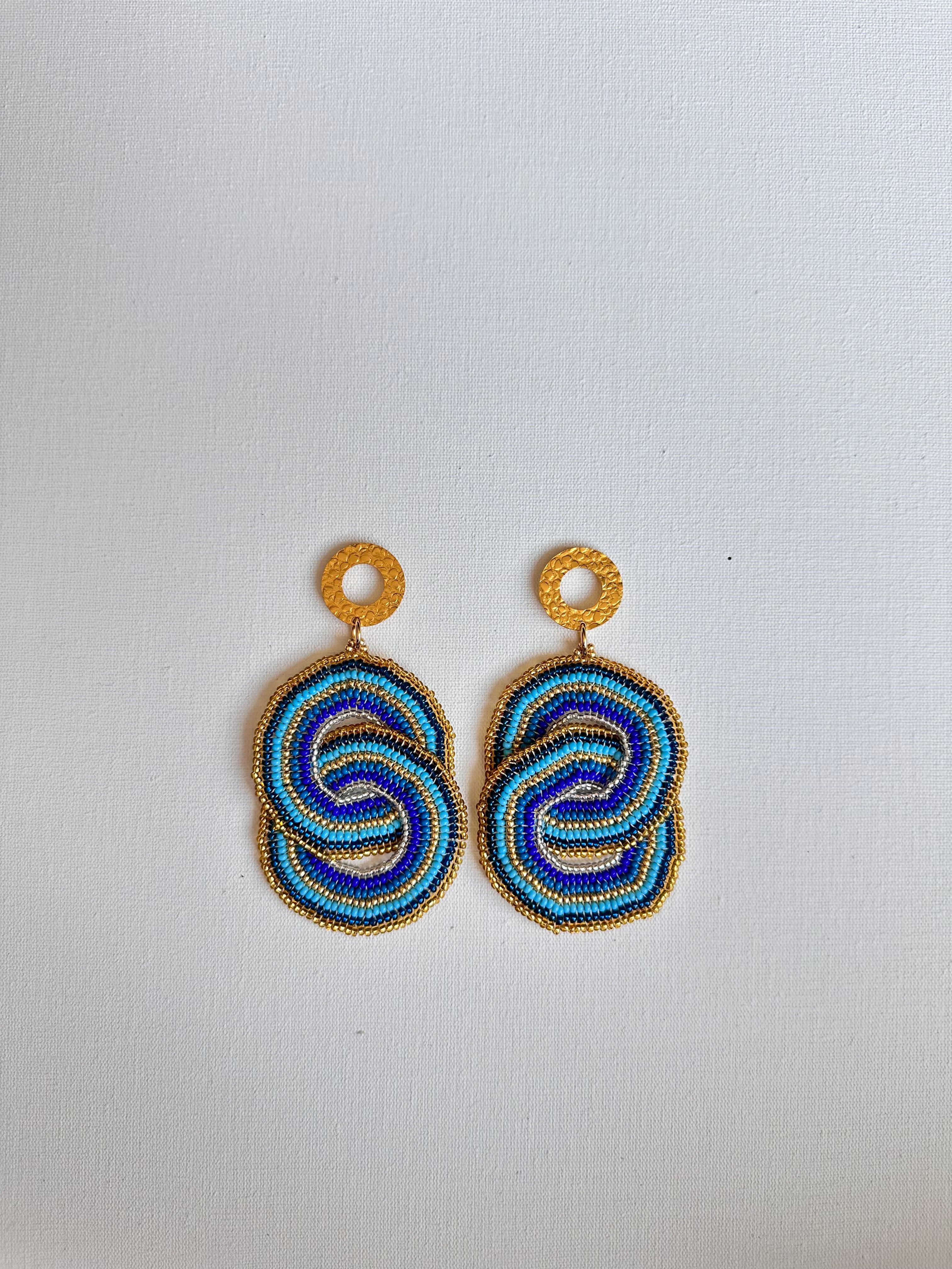 WORK OF THE BEADS CRISSCROSSED CIRCLES EARRINGS