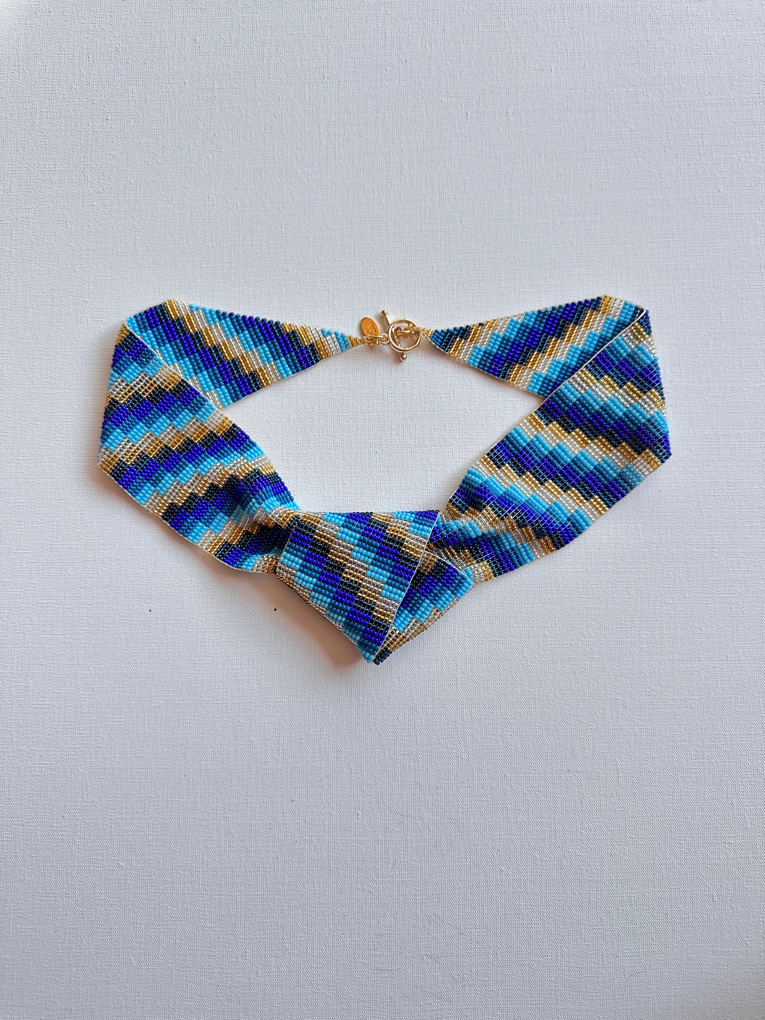 WORK OF THE BEADS KNOT NECKLACES